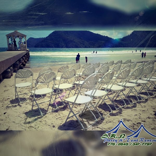 tent rentals trinidad kevin ramgoolam tent and event rentals white folding chairs at beach