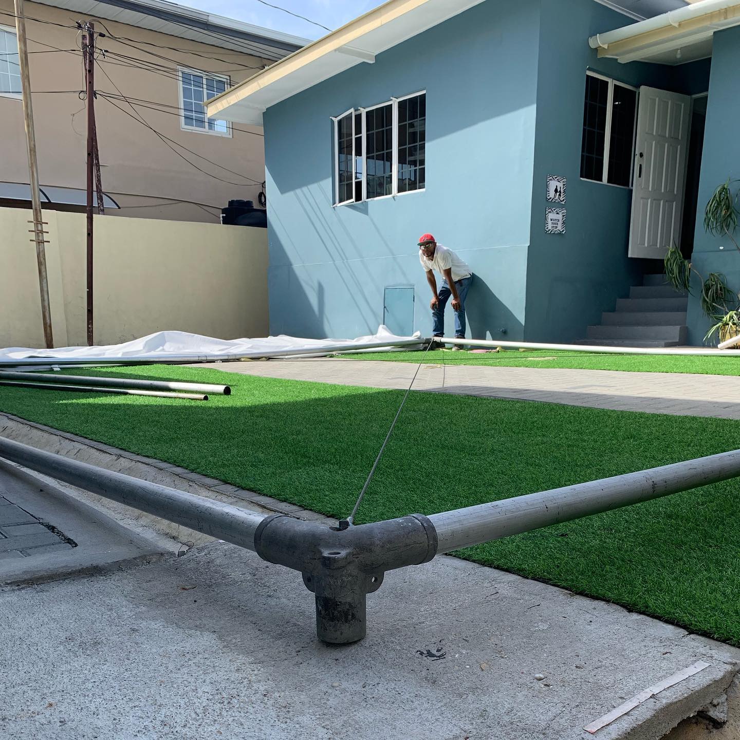 trinidad tent rentals team take down high peak marquee tent